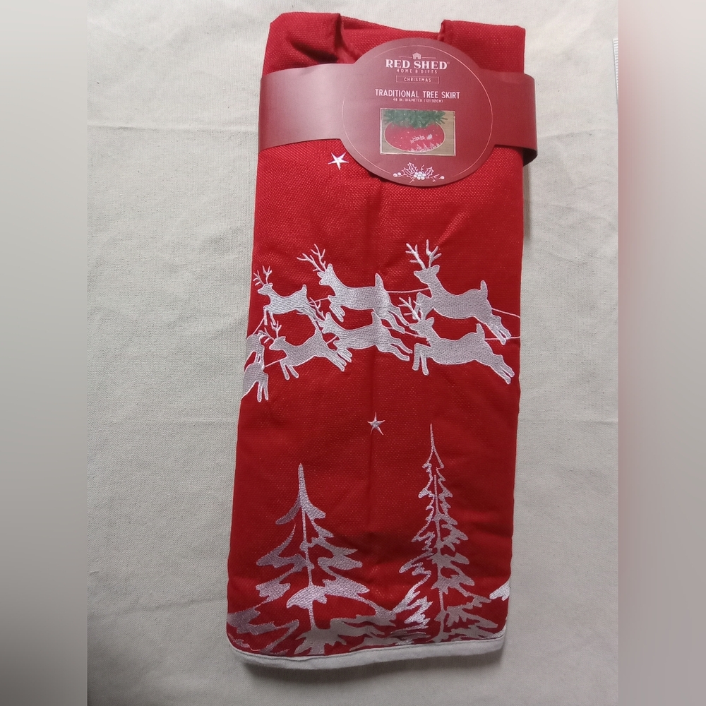 Red Shed Red 48" Tree Skirt with White Reindeer Design